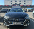 Чорний Хендай Соната, об'ємом двигуна 2.4 л та пробігом 77 тис. км за 13600 $, фото 1 на Automoto.ua