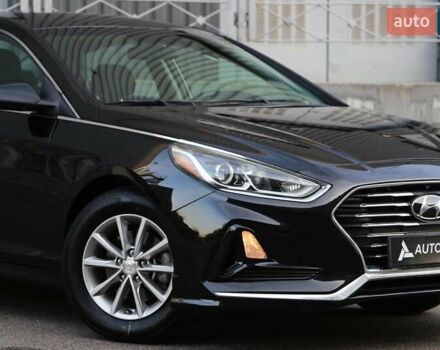 Чорний Хендай Соната, об'ємом двигуна 2.36 л та пробігом 77 тис. км за 13900 $, фото 3 на Automoto.ua