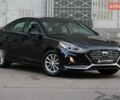 Чорний Хендай Соната, об'ємом двигуна 2.36 л та пробігом 77 тис. км за 13900 $, фото 1 на Automoto.ua