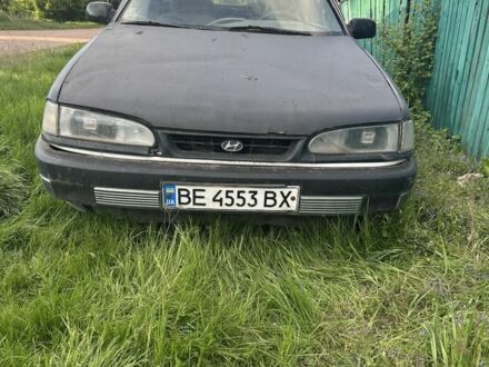 Хендай Соната 1992 у Прилуках на Automoto.ua Чорний Хендай Соната, об'ємом двигуна 2 л та пробігом 200 тис. км за 557 $, фото 1 на Automoto.ua