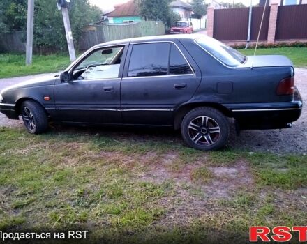 Черный Хендай Соната, объемом двигателя 2 л и пробегом 150 тыс. км за 650 $, фото 1 на Automoto.ua