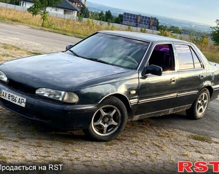 Черный Хендай Соната, объемом двигателя 2 л и пробегом 200 тыс. км за 950 $, фото 1 на Automoto.ua