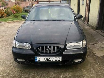 Хендай Соната 1996 у Кременчуге на Automoto.ua Чорний Хендай Соната, об'ємом двигуна 2 л та пробігом 400 тис. км за 2000 $, фото 1 на Automoto.ua