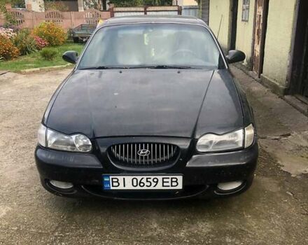 Чорний Хендай Соната, об'ємом двигуна 2 л та пробігом 400 тис. км за 2000 $, фото 1 на Automoto.ua