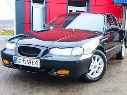 Черный Хендай Соната, объемом двигателя 2 л и пробегом 200 тыс. км за 1450 $, фото 1 на Automoto.ua