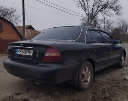 Черный Хендай Соната, объемом двигателя 2 л и пробегом 210 тыс. км за 1800 $, фото 1 на Automoto.ua