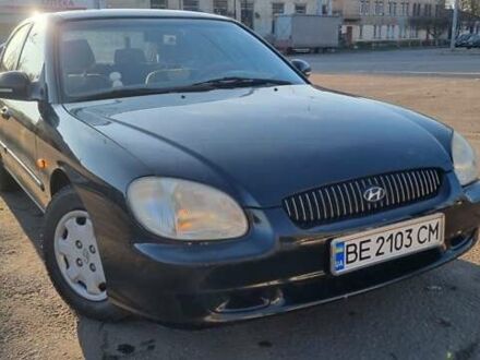 Черный Хендай Соната, объемом двигателя 2 л и пробегом 241 тыс. км за 2600 $, фото 1 на Automoto.ua