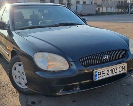 Черный Хендай Соната, объемом двигателя 2 л и пробегом 241 тыс. км за 2600 $, фото 1 на Automoto.ua