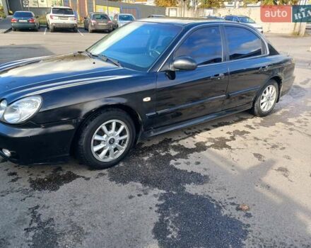 Черный Хендай Соната, объемом двигателя 2 л и пробегом 345 тыс. км за 2900 $, фото 1 на Automoto.ua