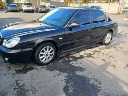 Черный Хендай Соната, объемом двигателя 2 л и пробегом 346 тыс. км за 3000 $, фото 1 на Automoto.ua