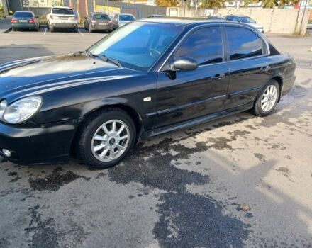 Черный Хендай Соната, объемом двигателя 2 л и пробегом 346 тыс. км за 3000 $, фото 1 на Automoto.ua