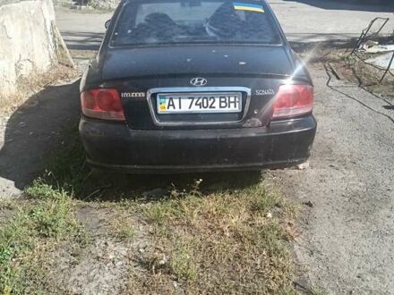 Черный Хендай Соната, объемом двигателя 2 л и пробегом 532 тыс. км за 1500 $, фото 1 на Automoto.ua