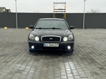 Черный Хендай Соната, объемом двигателя 2 л и пробегом 250 тыс. км за 2000 $, фото 1 на Automoto.ua