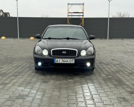 Черный Хендай Соната, объемом двигателя 2 л и пробегом 250 тыс. км за 2000 $, фото 1 на Automoto.ua