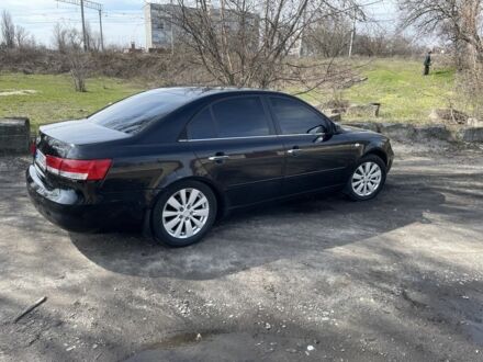 Чорний Хендай Соната, об'ємом двигуна 2.4 л та пробігом 220 тис. км за 4999 $, фото 1 на Automoto.ua