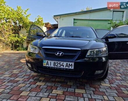 Черный Хендай Соната, объемом двигателя 2 л и пробегом 142 тыс. км за 6000 $, фото 1 на Automoto.ua