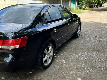 Черный Хендай Соната, объемом двигателя 2.4 л и пробегом 258 тыс. км за 6700 $, фото 1 на Automoto.ua