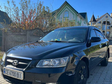 Чорний Хендай Соната, об'ємом двигуна 2.36 л та пробігом 272 тис. км за 5300 $, фото 1 на Automoto.ua