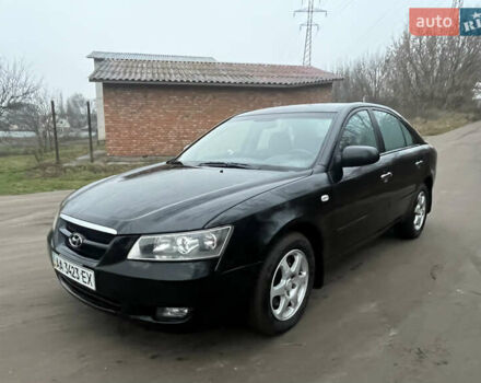 Черный Хендай Соната, объемом двигателя 2 л и пробегом 161 тыс. км за 5900 $, фото 1 на Automoto.ua