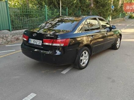 Чорний Хендай Соната, об'ємом двигуна 2.4 л та пробігом 243 тис. км за 4300 $, фото 1 на Automoto.ua
