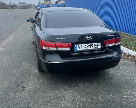 Черный Хендай Соната, объемом двигателя 2.36 л и пробегом 220 тыс. км за 3950 $, фото 1 на Automoto.ua