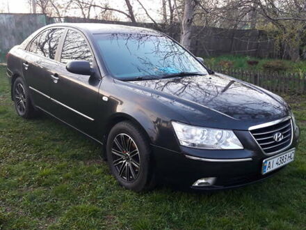 Черный Хендай Соната, объемом двигателя 2 л и пробегом 497 тыс. км за 5800 $, фото 1 на Automoto.ua