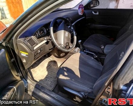 Черный Хендай Соната, объемом двигателя 2 л и пробегом 275 тыс. км за 5000 $, фото 1 на Automoto.ua