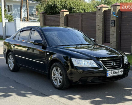 Черный Хендай Соната, объемом двигателя 2 л и пробегом 259 тыс. км за 5900 $, фото 1 на Automoto.ua