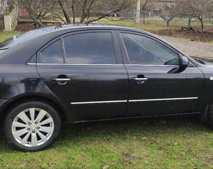 Черный Хендай Соната, объемом двигателя 2.4 л и пробегом 275 тыс. км за 6000 $, фото 1 на Automoto.ua