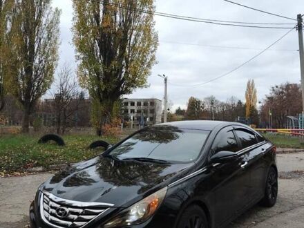Чорний Хендай Соната, об'ємом двигуна 2 л та пробігом 216 тис. км за 7499 $, фото 1 на Automoto.ua