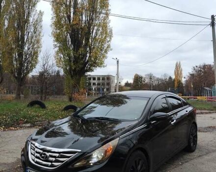 Черный Хендай Соната, объемом двигателя 2 л и пробегом 216 тыс. км за 7499 $, фото 1 на Automoto.ua