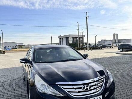 Чорний Хендай Соната, об'ємом двигуна 2 л та пробігом 237 тис. км за 7500 $, фото 1 на Automoto.ua