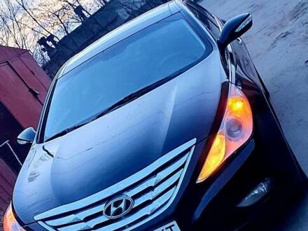 Черный Хендай Соната, объемом двигателя 2.36 л и пробегом 165 тыс. км за 9900 $, фото 1 на Automoto.ua