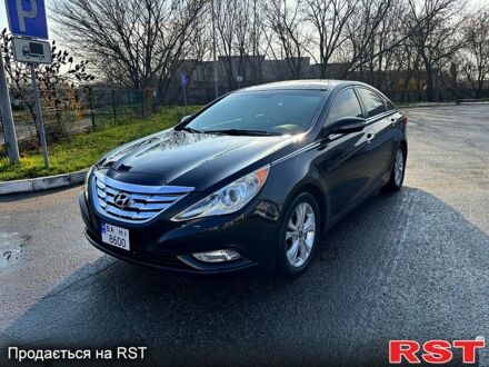Черный Хендай Соната, объемом двигателя 2.4 л и пробегом 200 тыс. км за 7600 $, фото 1 на Automoto.ua