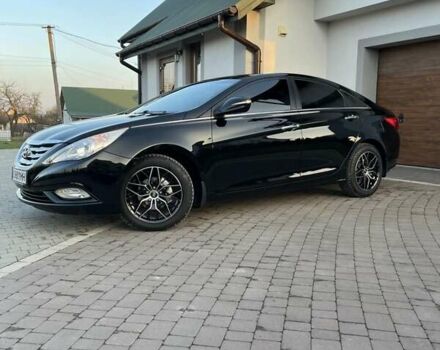 Черный Хендай Соната, объемом двигателя 2.4 л и пробегом 148 тыс. км за 10100 $, фото 1 на Automoto.ua
