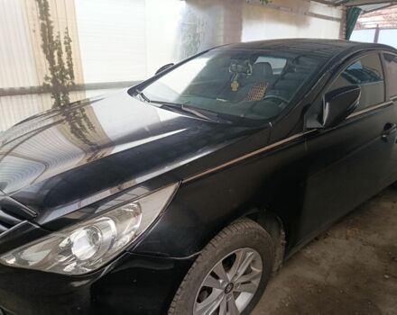 Черный Хендай Соната, объемом двигателя 2 л и пробегом 166 тыс. км за 9500 $, фото 1 на Automoto.ua