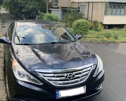 Чорний Хендай Соната, об'ємом двигуна 2.4 л та пробігом 128 тис. км за 8500 $, фото 1 на Automoto.ua