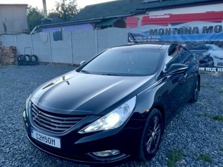 Чорний Хендай Соната, об'ємом двигуна 2.4 л та пробігом 231 тис. км за 9500 $, фото 1 на Automoto.ua