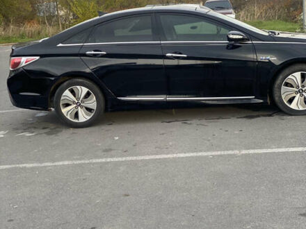 Черный Хендай Соната, объемом двигателя 2.4 л и пробегом 208 тыс. км за 11700 $, фото 1 на Automoto.ua