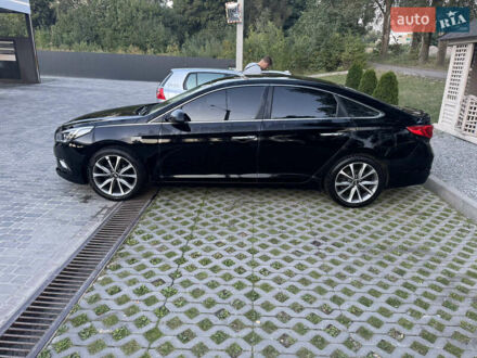 Черный Хендай Соната, объемом двигателя 2 л и пробегом 250 тыс. км за 10700 $, фото 1 на Automoto.ua