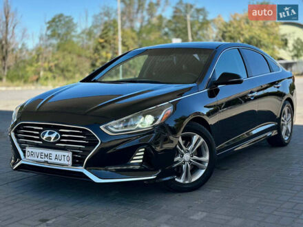 Чорний Хендай Соната, об'ємом двигуна 2.4 л та пробігом 173 тис. км за 11899 $, фото 1 на Automoto.ua