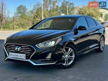 Черный Хендай Соната, объемом двигателя 2.4 л и пробегом 174 тыс. км за 11799 $, фото 1 на Automoto.ua