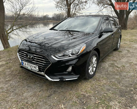 Чорний Хендай Соната, об'ємом двигуна 2.4 л та пробігом 175 тис. км за 11700 $, фото 1 на Automoto.ua