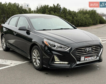 Чорний Хендай Соната, об'ємом двигуна 2.36 л та пробігом 104 тис. км за 12999 $, фото 1 на Automoto.ua