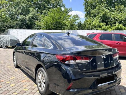 Чорний Хендай Соната, об'ємом двигуна 2.4 л та пробігом 154 тис. км за 11500 $, фото 1 на Automoto.ua