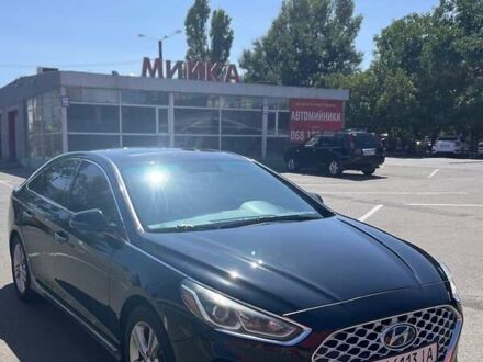 Черный Хендай Соната, объемом двигателя 2.36 л и пробегом 137 тыс. км за 14000 $, фото 1 на Automoto.ua