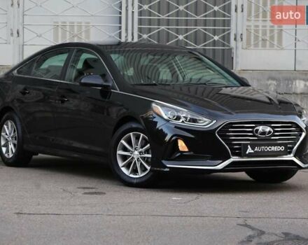 Чорний Хендай Соната, об'ємом двигуна 2.36 л та пробігом 77 тис. км за 13900 $, фото 1 на Automoto.ua