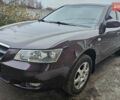 Фіолетовий Хендай Соната, об'ємом двигуна 2.4 л та пробігом 215 тис. км за 5800 $, фото 1 на Automoto.ua