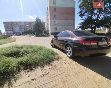 Фиолетовый Хендай Соната, объемом двигателя 2.36 л и пробегом 311 тыс. км за 6500 $, фото 5 на Automoto.ua