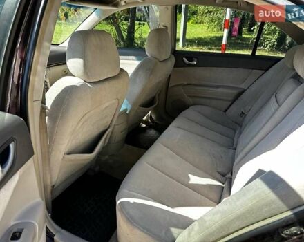 Фиолетовый Хендай Соната, объемом двигателя 2.4 л и пробегом 256 тыс. км за 4988 $, фото 19 на Automoto.ua